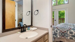 A bathroom with a large mirror, a sink, and a ceiling fan. - 1 Mile to Dollywood and Pigeon Forge Strip! (Pigeon Forge)