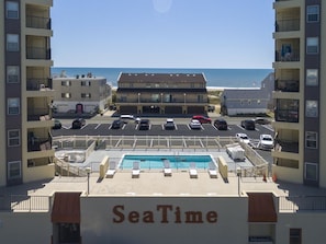 Guests can enjoy stunning beach views from the comfort of their room or by lounging by the pool.