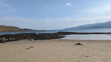 On the beach, white sand