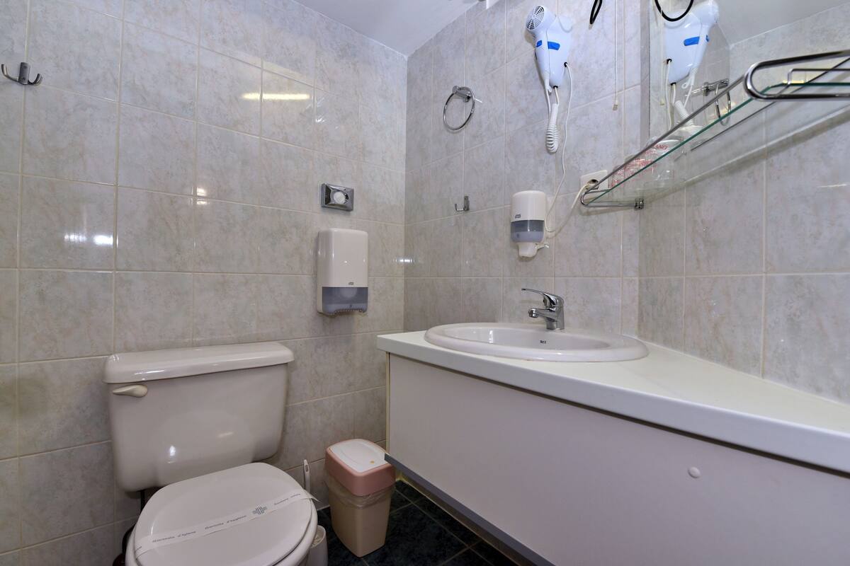 family room | desk, laptop workspace, travel cot, free wifi