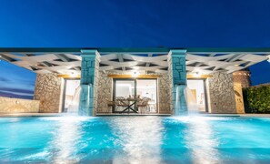 Seasonal outdoor pool, pool loungers