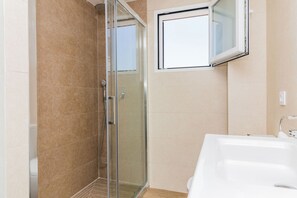 Shower, hair dryer, towels, soap