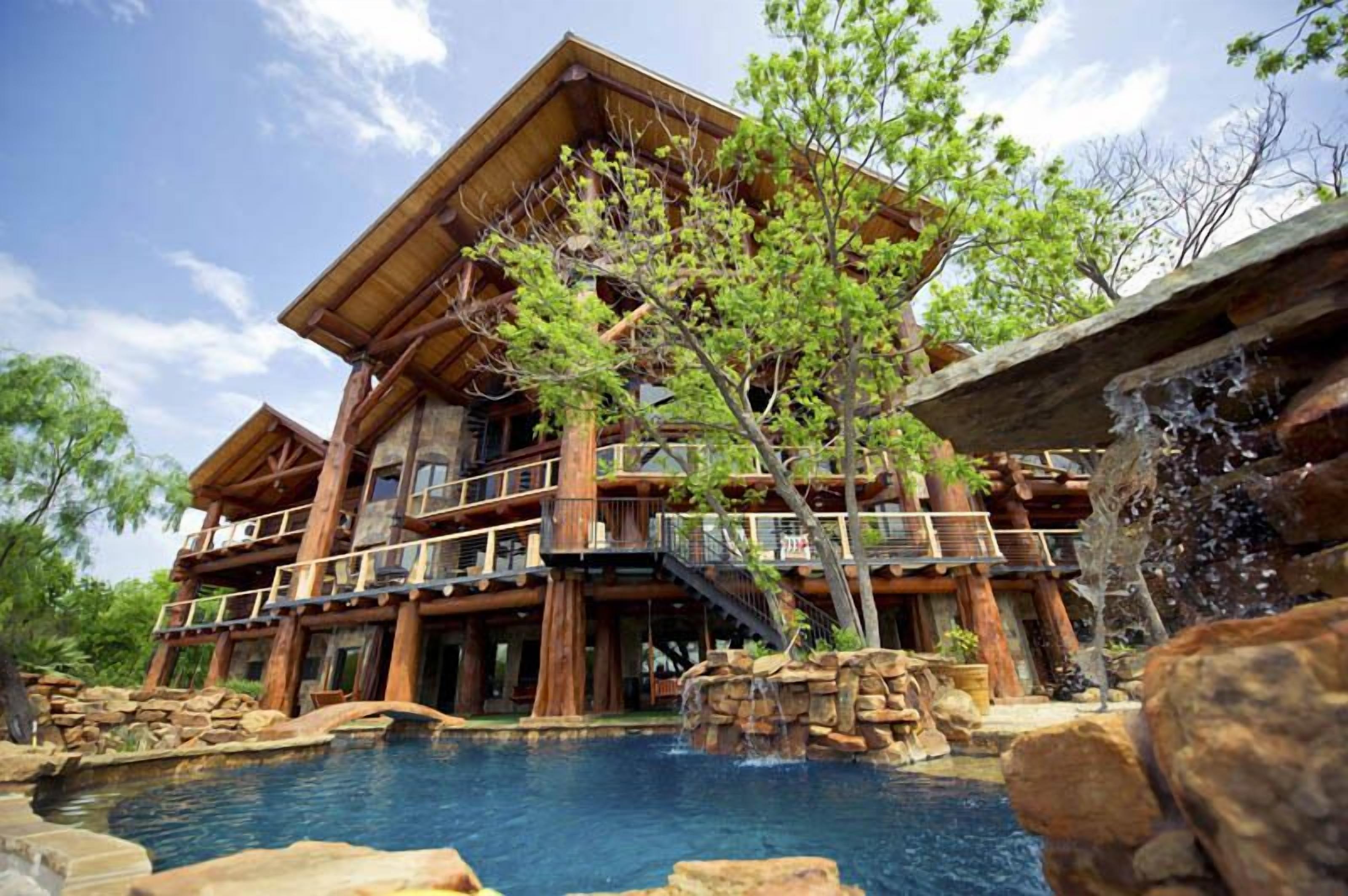 A heated pool, sun loungers