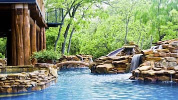 A heated pool, sun loungers