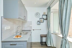 Imagen sin descripción, 5 de 16, botón