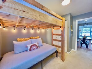 A bedroom with a bunk bed, a desk, and a window. - Lake + Waterfront + Dock + HotTub + Kayaks + Walking distance to Woody's (Russells Point)