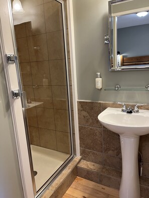 Combined shower/tub, hair dryer, towels, soap