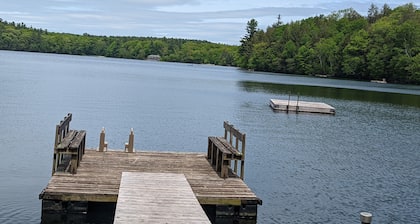 Great Family Cabin in the woods on a lake.