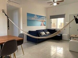 TV - Spacious Apt | Pool (Playa del Carmen)