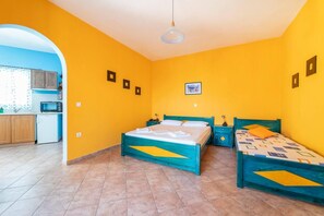Departamento | 1 habitación, tabla de planchar con plancha, wifi gratis y ropa de cama 