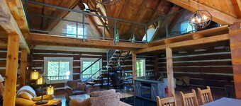 Luxury waterfront Log Cabin w/hot tub and sauna