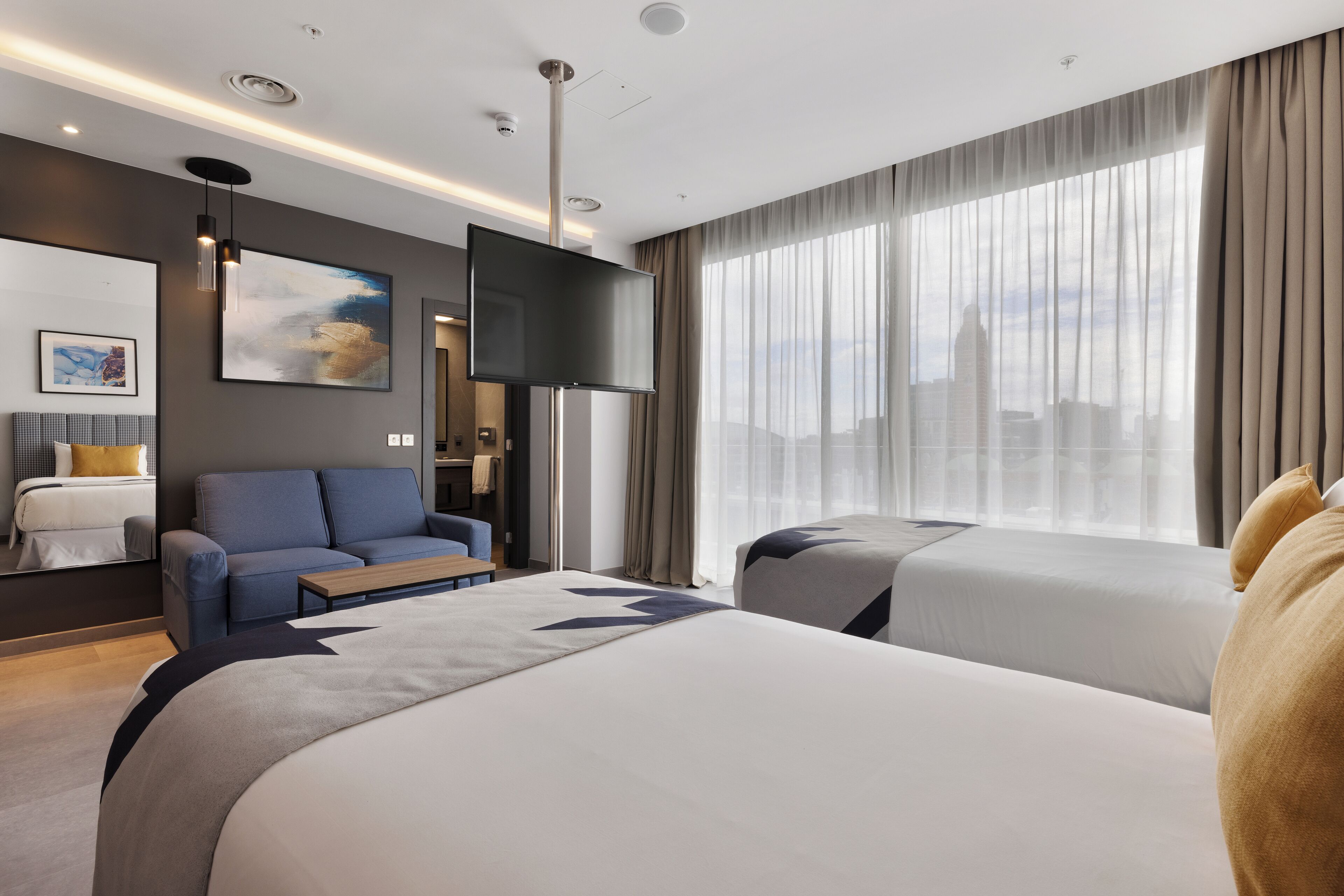 Family Quadruple (1 KingBed and 1 Sofa Bed)/ (2 TwinBed |Sofa Bed) | Minibar, in-room safe, desk, laptop workspace