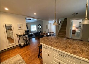 Enjoy cooking and dining in this well-lit kitchen with a central island and dining area.