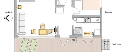Een plattegrond van een hotelkamer met een bed, een zithoek met televisie, een kitchenette en een badkamer.