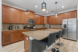 Microwave, dishwasher, high chair, paper towels - Amazing House 6 Bedrooms/5 Bath/Pool/Movie Theater (Davenport)