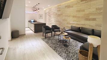 Departamento | Área de sala de estar | Smart TV de 65 pulgadas con canales digitales, televisión y Netflix