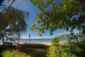On the beach, sun loungers, beach towels