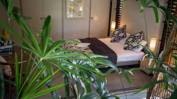 4 habitaciones, tabla de planchar con plancha, wifi y ropa de cama