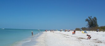 Upscale condo steps from gorgeous Vanderbilt beach