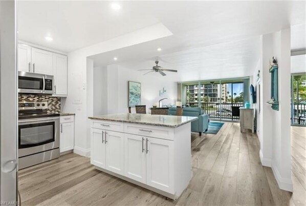 Fridge, microwave, oven, stovetop - Upscale condo steps from gorgeous Vanderbilt beach (Naples)