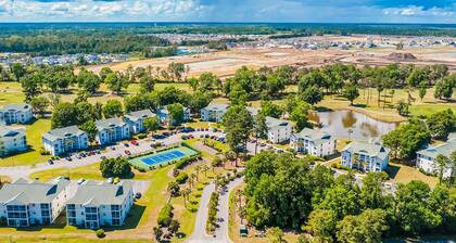 River-view condo with WiFi, central AC & w/d - indoor/outdoor pool & hot tub