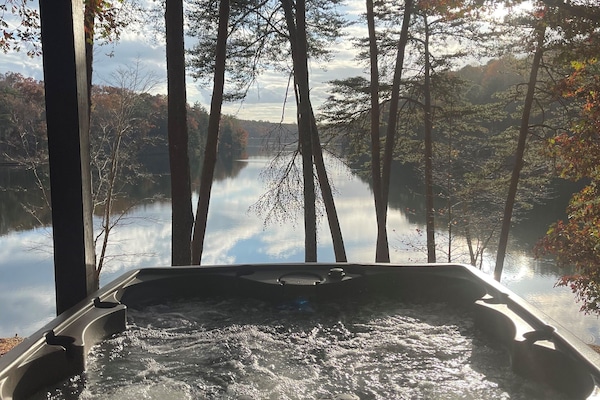 Enjoy spectacular views from the comfort of private spa