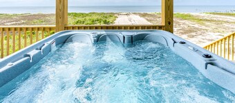 Oceanfront home with sun deck by ocean, Gulf/bay views, pool, & hot tub