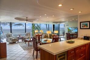 Fridge, microwave, oven, stovetop - Oceanfront condo with lanai, central AC, W/D, pool, hot tub & beach access (Lahaina)