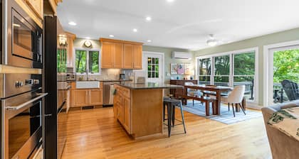 Gorgeous lakeview retreat with wraparound porch, wood stove, & WiFi - dogs OK