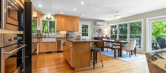 Gorgeous lakeview retreat with wraparound porch, wood stove, & WiFi - dogs OK