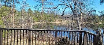 Secluded chalet in the woods overlooking a huge pond only 5 minutes to town.