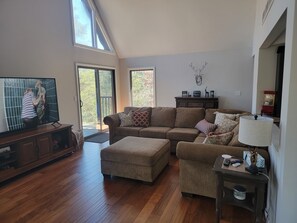 Smart TV, foosball, books, music library