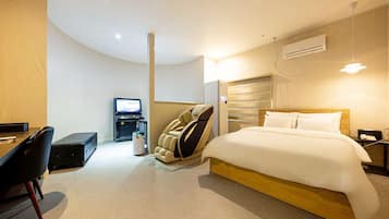 Premium Room | Living area | 65-inch Smart TV with digital channels, TV, Netflix