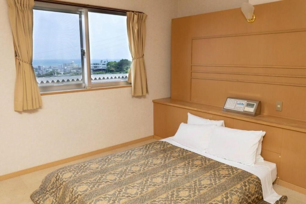 Economy Room | Individually decorated, individually furnished, blackout drapes