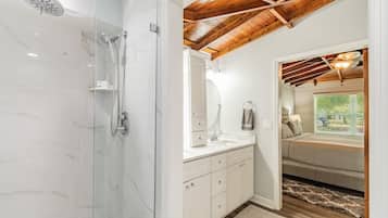 Bathtub, hair dryer, shampoo