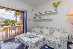 Family Apartment, 2 Bedrooms (I Fari 98 600m From The Beach) | Dining - I Fari 98 600m From The Beach (Loiri Porto San Paolo)
