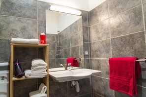 Shower, hair dryer, towels