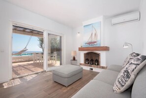 TV, fireplace - Holiday Home Villa Domus Alba B with Sea View, Pool, Garden & Wi-Fi (portocolom)