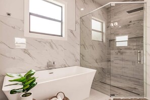 Shower, hair dryer, towels