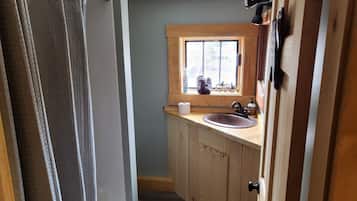 Shower, towels, soap, toilet paper