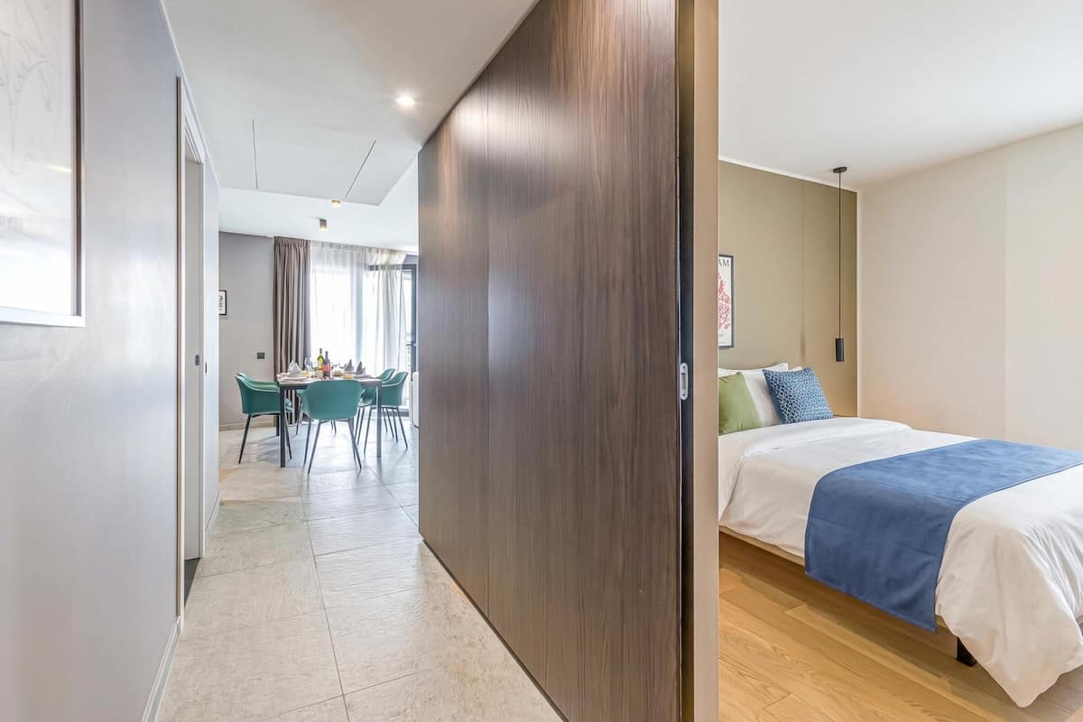Family Apartment, Multiple Bedrooms, 2 Bathrooms (ICON H Lugano 501 Suite Business) | Laptop workspace, iron/ironing board, free WiFi, bed sheets