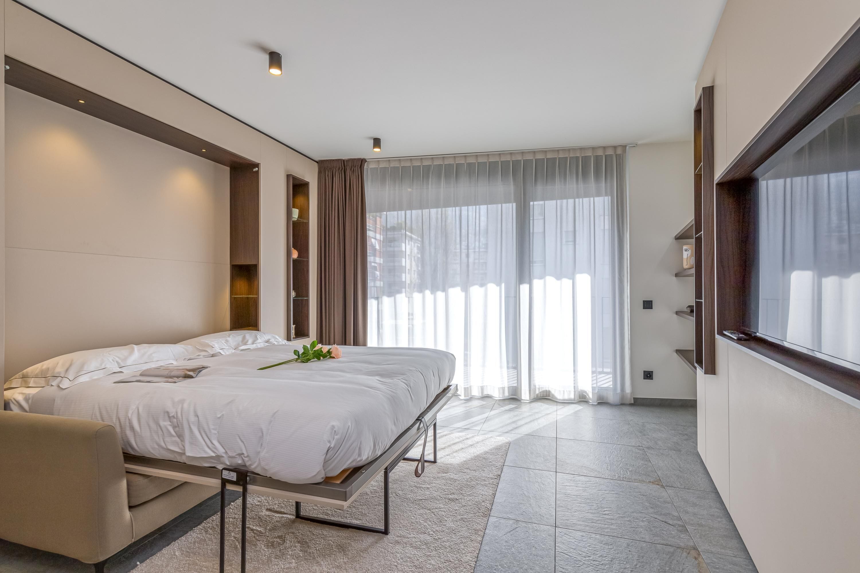 Family Studio (ICON H Lugano 302 Suite Micro-Living) | Laptop workspace, iron/ironing board, free WiFi, bed sheets