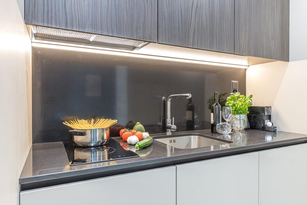 Family Studio (ICON H Lugano 404 Suite Micro Living) | Private kitchen | Fridge, microwave, stovetop, espresso maker