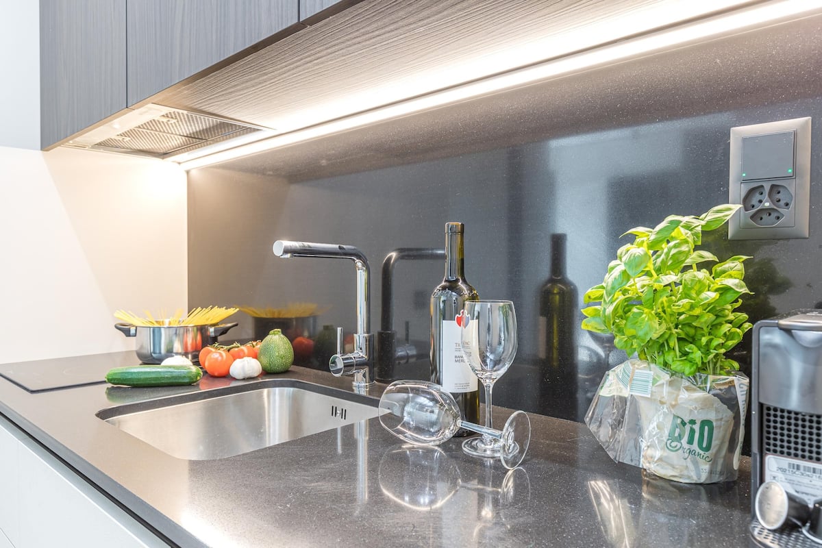 Family Studio (ICON H Lugano 504 Suite Micro-Living) | Private kitchen | Fridge, microwave, stovetop, espresso maker