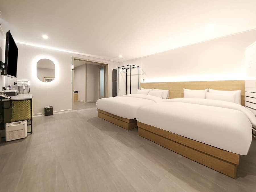 Family Room | Premium bedding, down comforters, pillowtop beds, desk