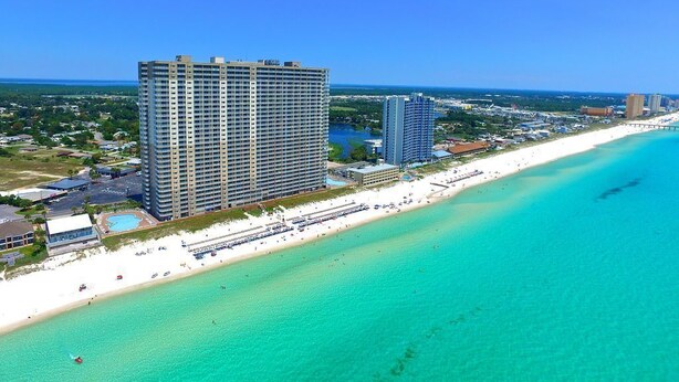 A high-rise hotel with a beach view, a pool, and a long beachfront promenade. - *Aug 29 - Sept 3 Open! *Beautiful, Gulf Front!* (Panama City Beach)