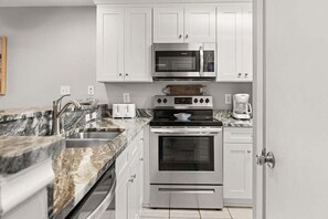 Condo, 2 Bedrooms | Private kitchen | Fridge, microwave, oven, coffee/tea maker