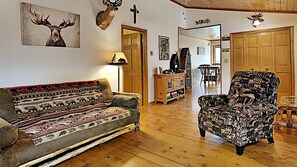 Cabin, Multiple Beds, Patio | Living area | 40-inch TV with cable channels - Little House In The Big Woods (Hayward)