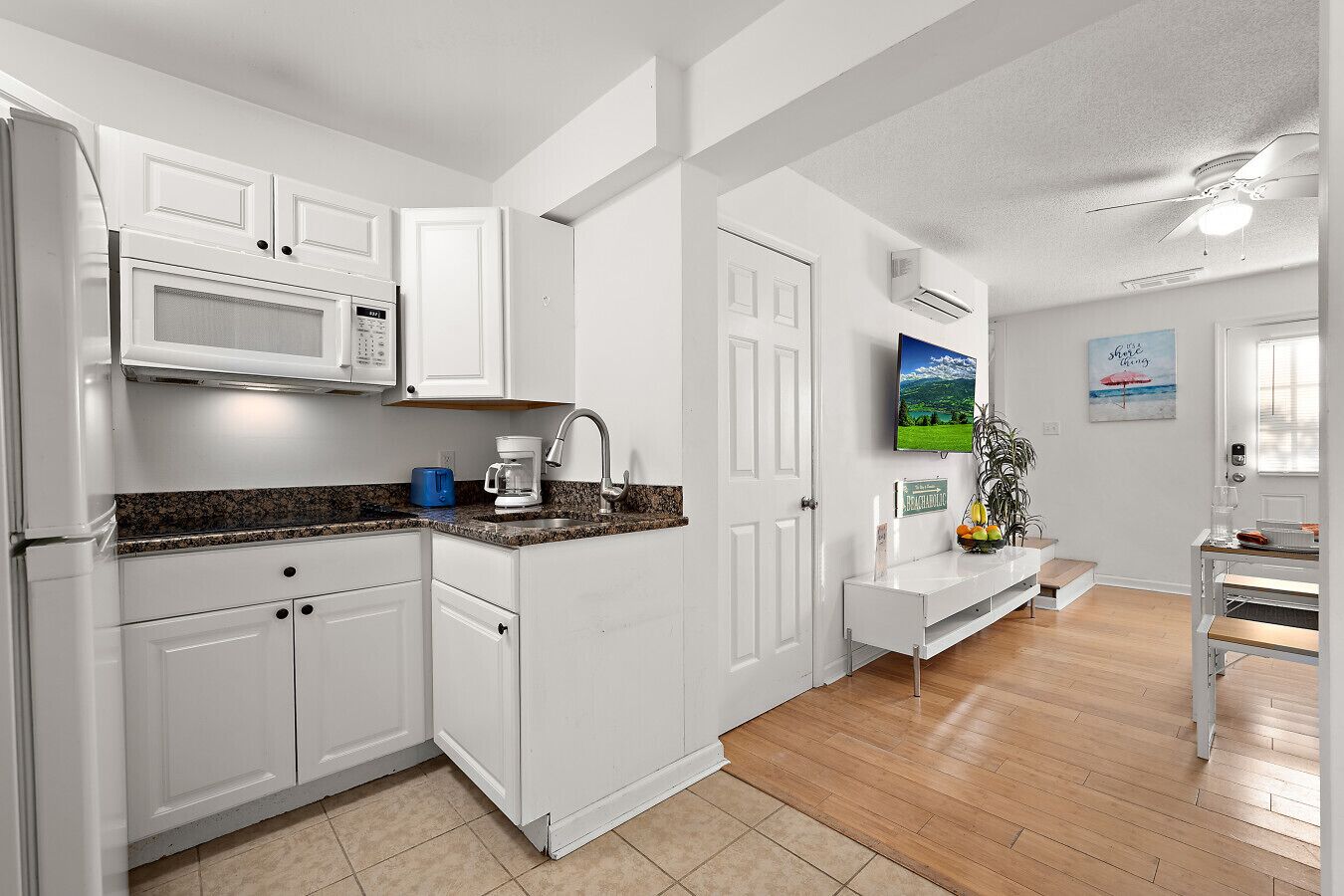 Fridge, microwave, stovetop, coffee/tea maker