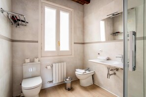 Bathtub, hair dryer, towels